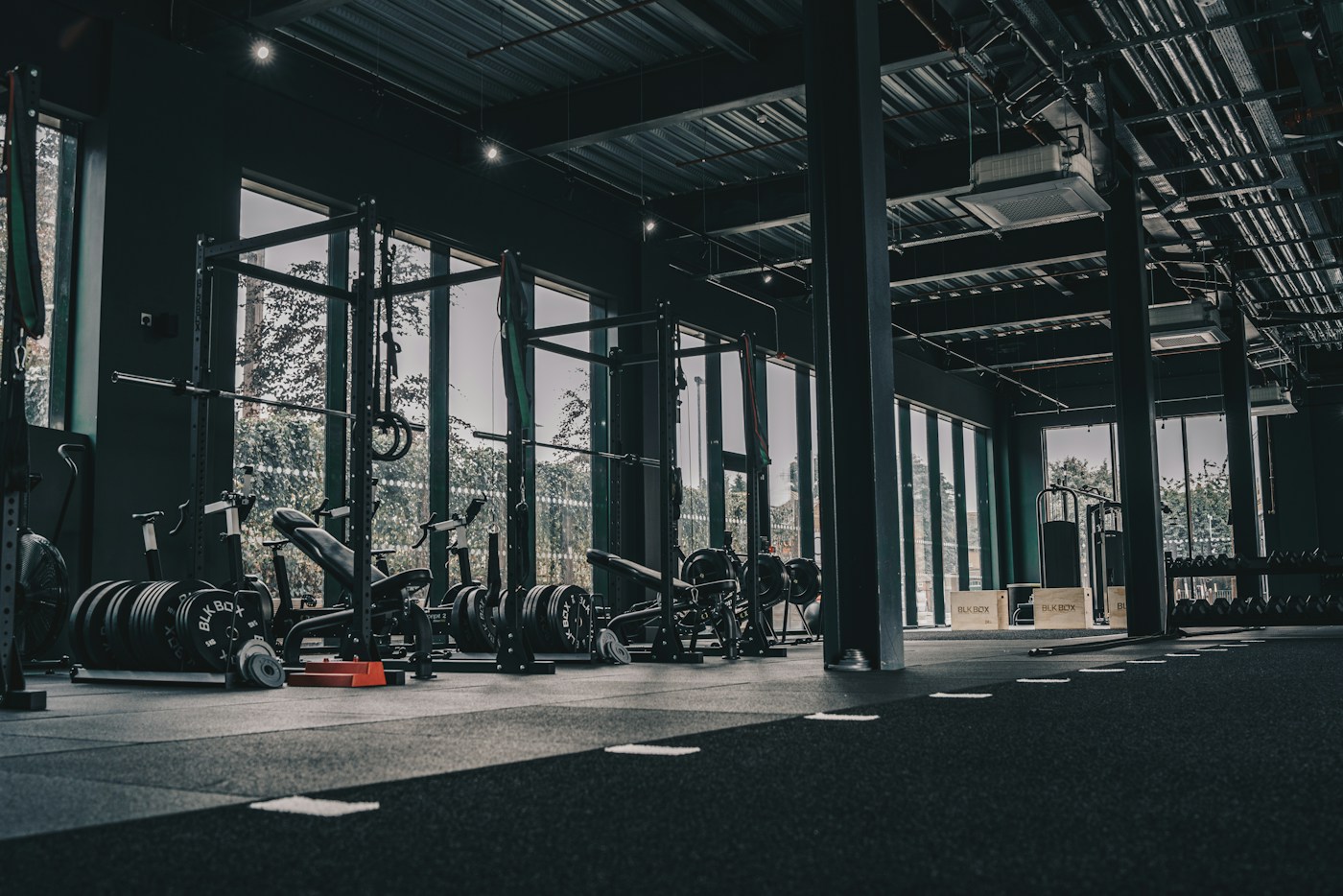 Light-filled strength training studio with weight equipment